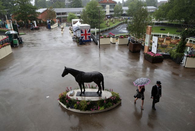 Umbrellas were the order of the day at Ascot