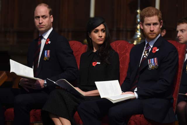 Prince William (left), Meghan Markle and Prince Harry during the service (Eddie Mulholland/Daily Telegraph/PA)