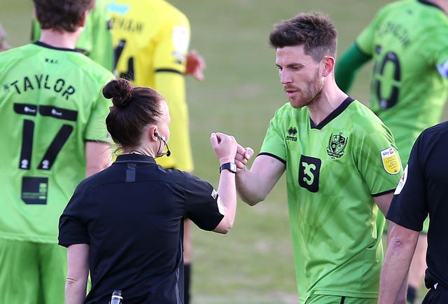 Rebecca Welch and Port Vale’s Shaun Brisley after the final whistle