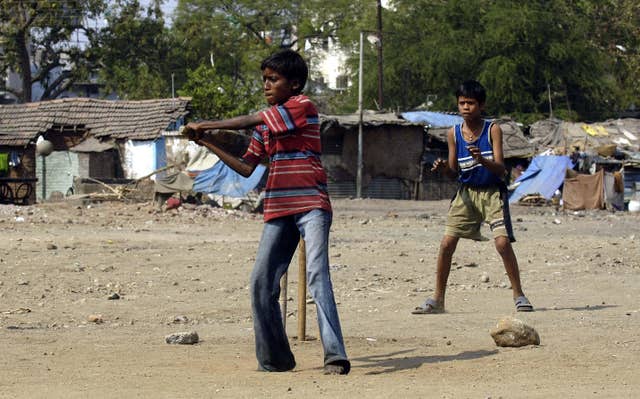 Children play cricket