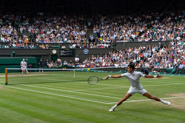 Novak Djokovic stretches for a backhand