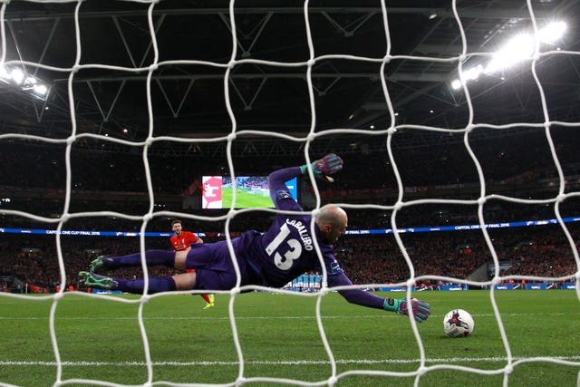 City keeper Willy Caballero saves a penalty from Adam Lallana