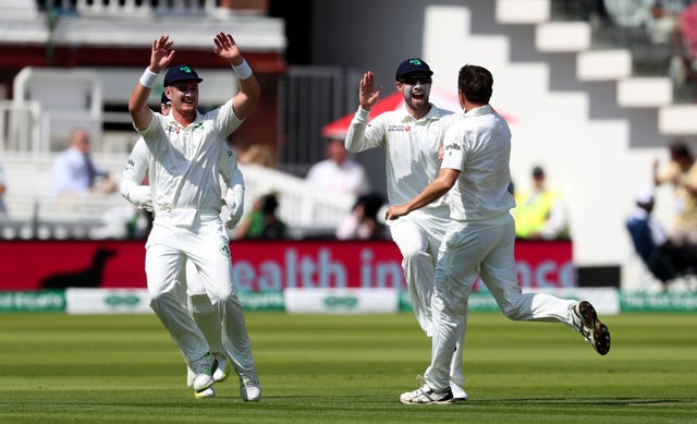 Ireland's Paul Stirling celebrates after catching out England's Jason Roy 