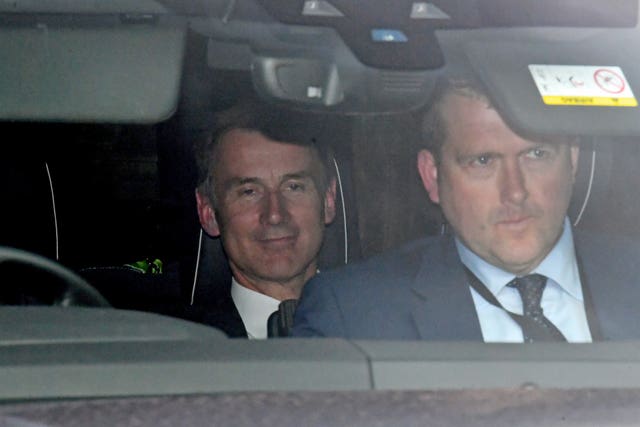 Jeremy Hunt leaves Parliament following the fifth vote 