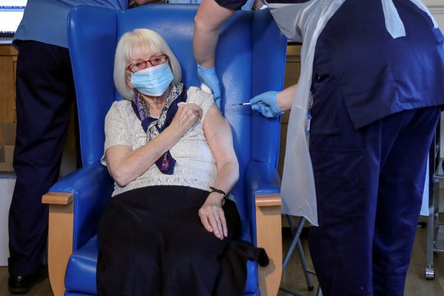 Resident Margaret Keating getting the vaccine