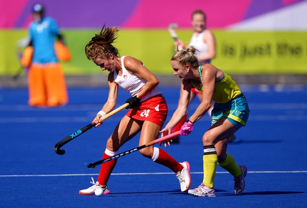 England’s Shona McCallin, left, and Australia’s Jane-Anne Claxton in action