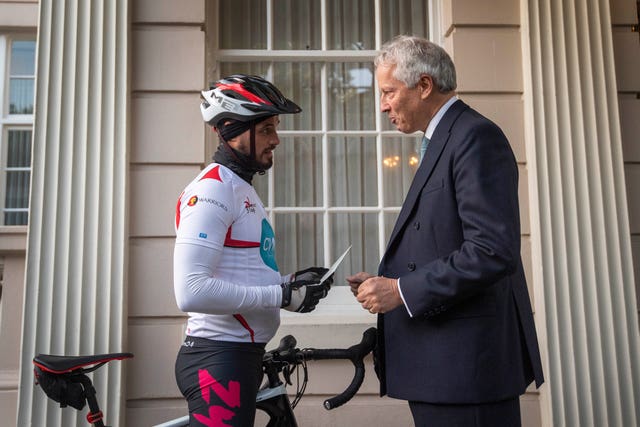 Charity fundraiser Josh Llewellyn-Jones arrives at St James’s Palace to be presented with a letter of support from the Prince of Wales by Lord Rosslyn, the Master of the Household