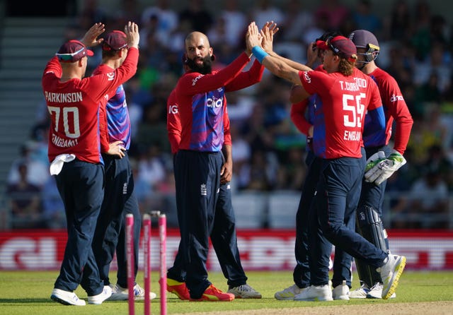 Moeen Ali celebrates taking a wicket
