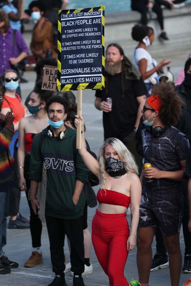 People gather in Trafalgar Square, London, after marching through central London, following a Black Lives Matter rally in Hyde Park