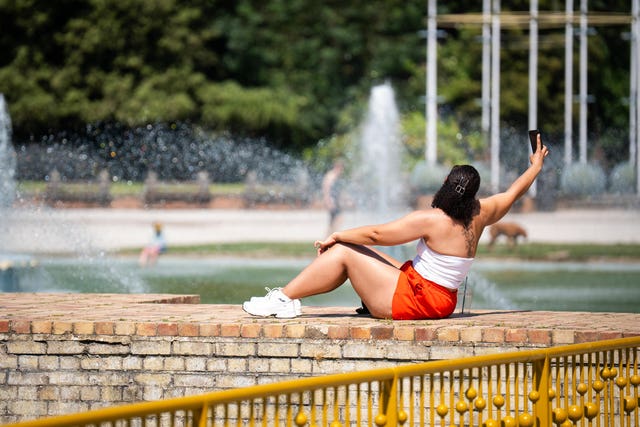 A sunbather in Battersea Park, south-west London