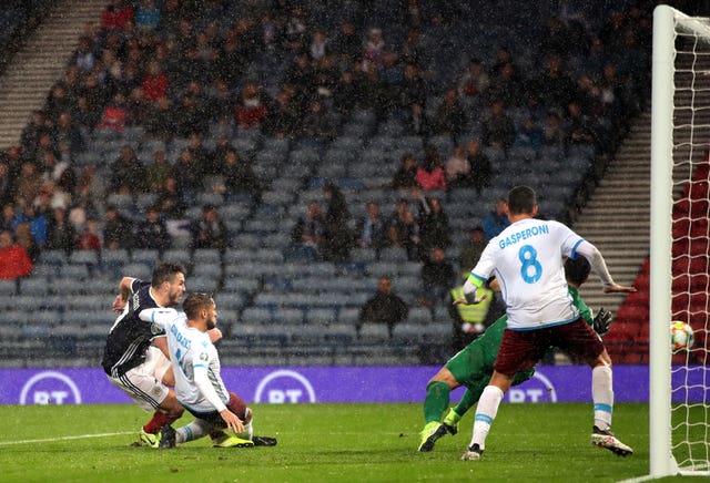 John McGinn completes his hat-trick as Scotland saw off San Marino in extremely wet conditions at Hampden Park