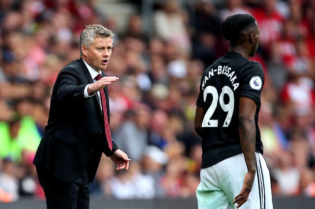 Ole Gunnar Solskjaer, left, may be without Aaron Wan-Bissaka on Saturday 