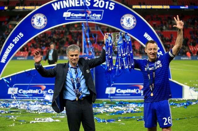 Terry, pictured alongside Jose Mourinho, claimed three League Cups with the Blues