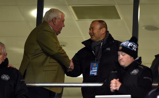 Tony Rowe (left) shakes hands with England head coach Eddie Jones. Rowe says England are 