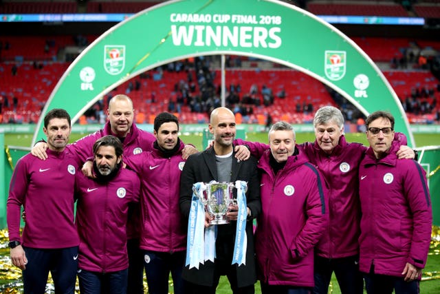 Guardiola collected his first silverware in England as his City side blew Arsenal away in their Carabao Cup final meeting.