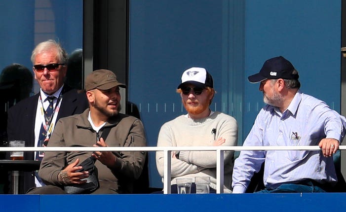 Singer Ed Sheeran, centre, was watching at Old Trafford