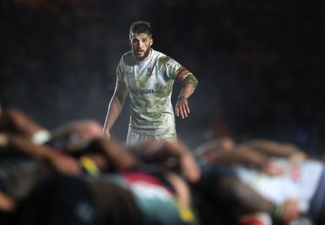 Ulster's Stuart McCloskey stands behind a scrum during the Champions Cup clash with Harlequins