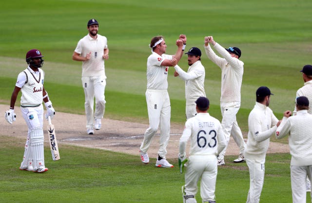 England’s Stuart Broad celebrates taking the wicket of West Indies’ Kraigg Brathwaite 