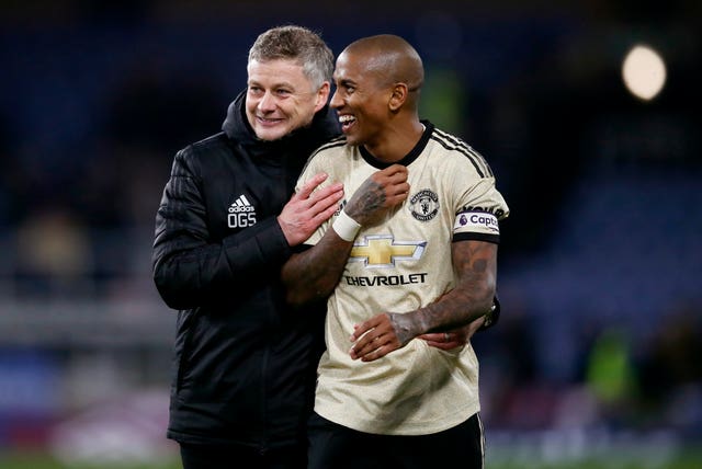 Ole Gunnar Solskjaer, left, wants to keep Ashley Young at Old Trafford 