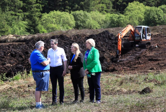 Minister of Justice Simon Harris, Senator Emer Currie and Minister for Social Protection Heather Humphreys with Oliver McVeigh, (left), the brother of Columba McVeigh, one of the Disappeared victims who was murdered and secretly buried by the IRA in 1975, during a visit to the remote Bragan Bog in Co Monaghan where a team from the Independent Commission for the Location of Victims’ Remains (ICLVR), are conducting a painstaking dig for the missing teenager