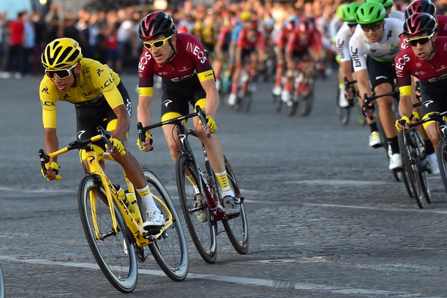 Egan Bernal rides ahead of Team Ineos colleague Geraint Thomas during stage 21 of the Tour de France