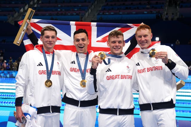 (Left to right) Great Britain’s Duncan Scott, James Guy, Matthew Richards and Tom Dean pose with their gold medals after winning the men’s 4 x 200m freestyle relay final at the Paris Olympics