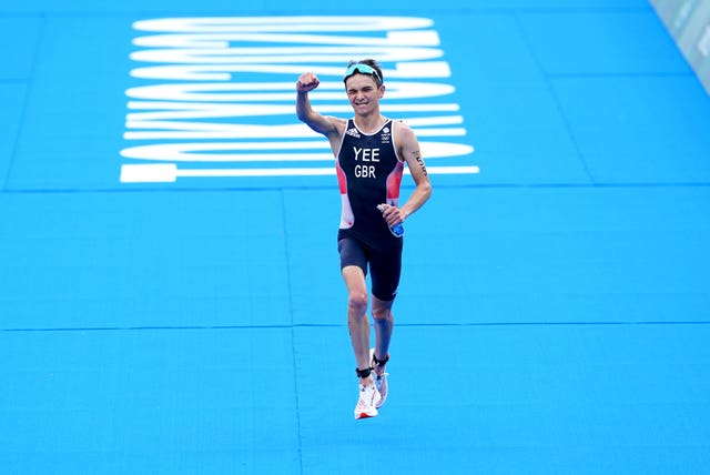 Alex Yee celebrates finishing second