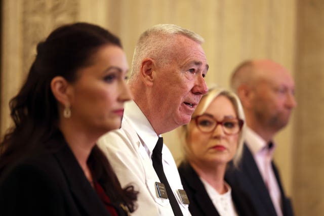 Deputy First Minister Emma Little-Pengelly, police chief Jon Boutcher, First Minister Michelle O’Neill and policing board chair Brendan Mullan speak to the media