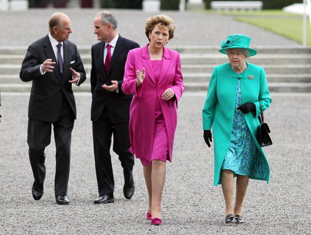 Queen Elizabeth II with then-Irish President Mary McAleese and the Duke of Edinburgh in Phoenix Park
