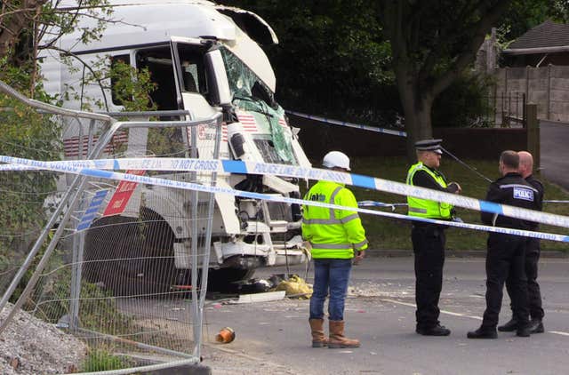 Lorry crashes into house