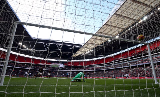 Son Heung-min (left) scores