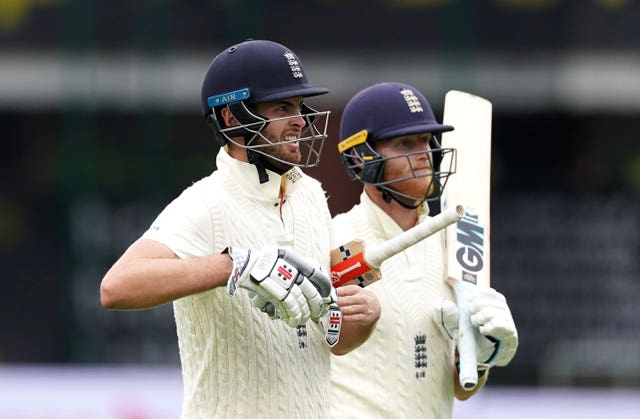 England's Dom Sibley and Ben Stokes walk off for tea 