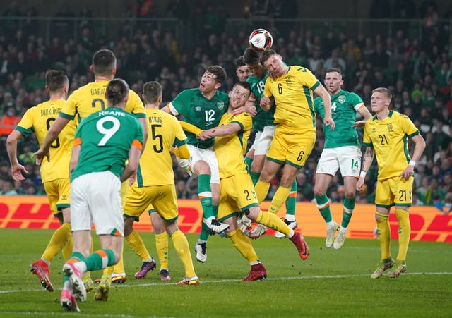 Dara O'Shea and Benas Satkus battle for the ball