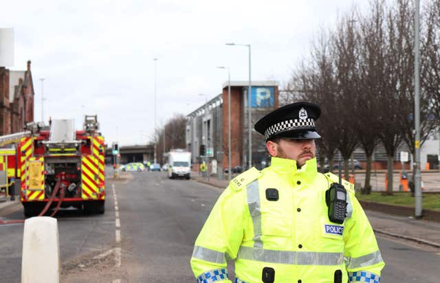 Police closed the street to traffic (Victoria Mitchell/PA)