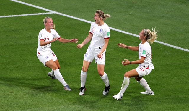 Ellen White, centre, celebrates the equaliser