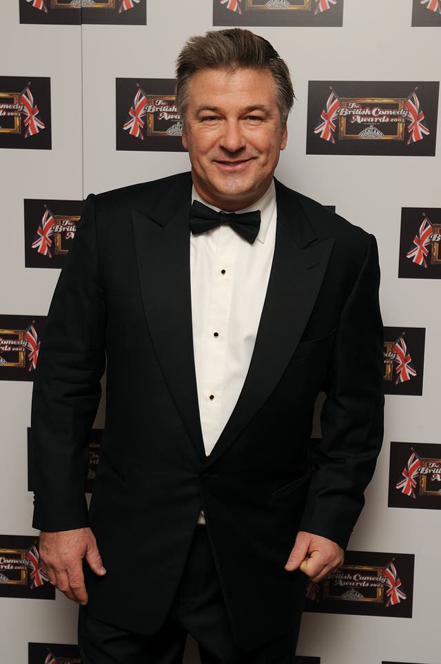 Alec Baldwin smiling at a red carpet event in 2008