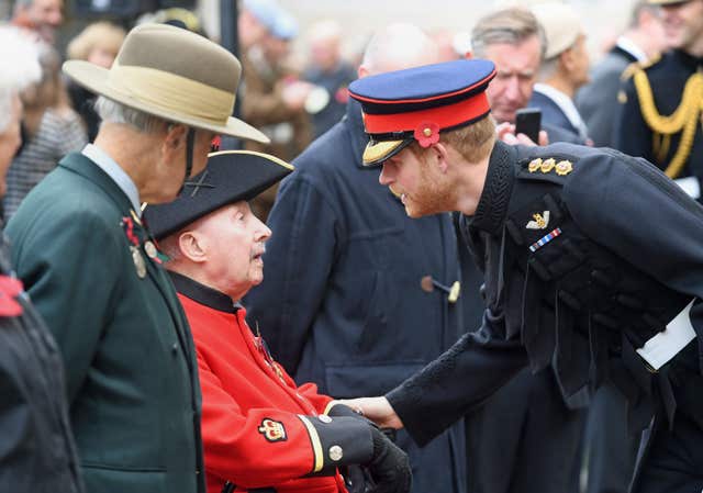 Prince Harry meeting veterans at Westminster Abbey’s Field of Remembrance last year