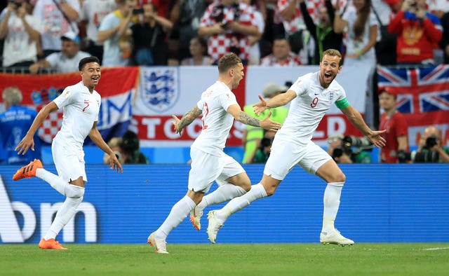 Kieran Trippier (centre) celebrates scoring his side’s first goal in the World Cup semi-final against Croatia.