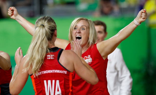 Neville, right, celebrates at the final whistle against Australia after winning gold at the 2018 Commonwealth Games 