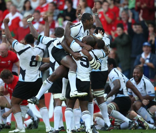 Fiji celebrate their win over Wales in Nantes 12 years ago