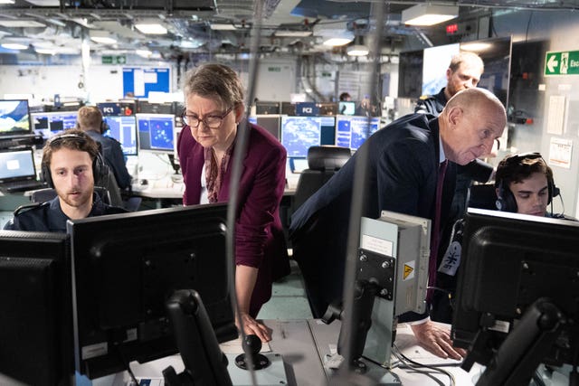 Defence Secretary John Healey and Foreign Secretary Yvette Cooper on HMS Prince of Wales