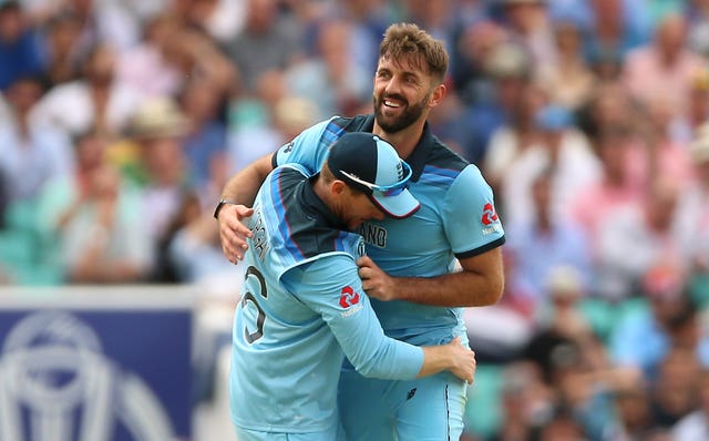 Liam Plunkett, right, celebrates a run-out with Eoin Morgan