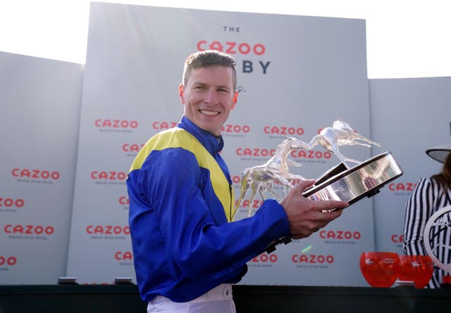 Richard Kingscote with the Derby trophy