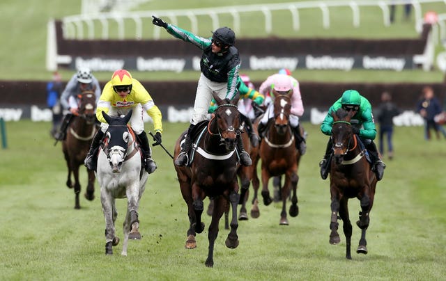 Altior and Nico de Boinville cross the line in front again in the Betway Queen Mother Champion Chase