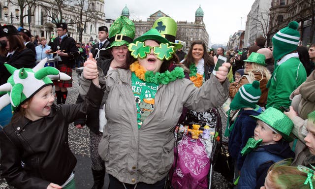 People enjoy the St Patrick’s day parade through Belfast city centre 