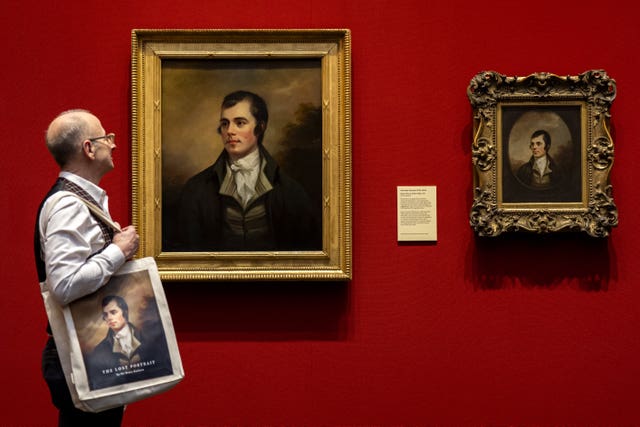 Sir Henry Raeburn's portrait of Robert Burns on display at the National Galleries Scotland next to the original painting by Alexander Nasmyth