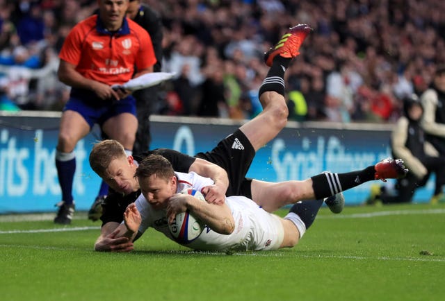 Chris Ashton, right, scores against New Zealand at Twickenham