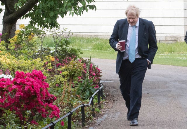Boris Johnson takes a morning walk in St James’ Park 