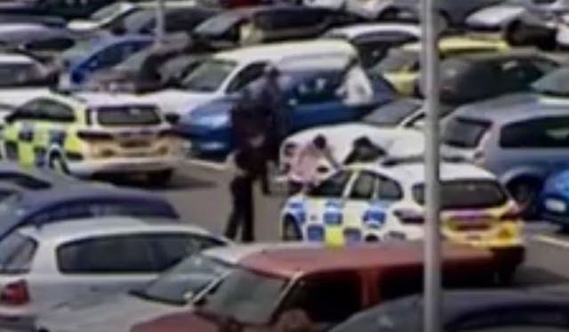 A CCTV image showing Joshua Stimpson being arrested at the Dockside retail outlet in Chatham, Kent shortly after he stabbed Ms McLaren to death (Kent Police/PA)