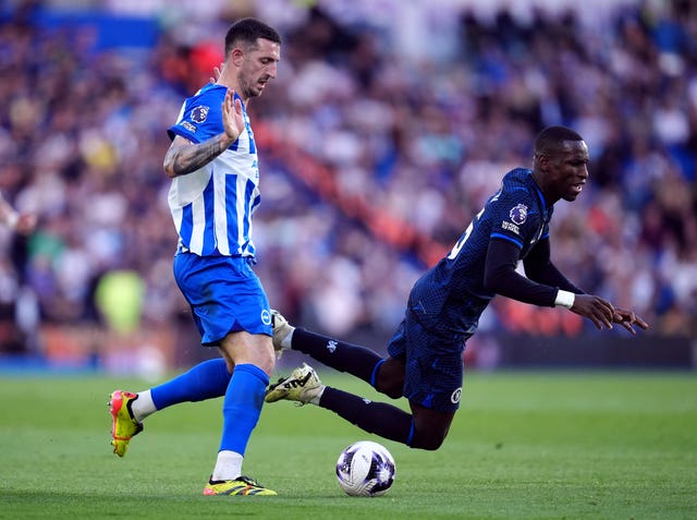 Brighton captain Lewis Dunk, left, was forced off injured against Chelsea